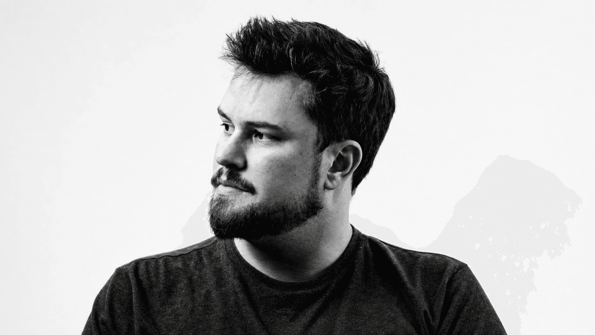 Black-and-white portrait of Daniel in profile